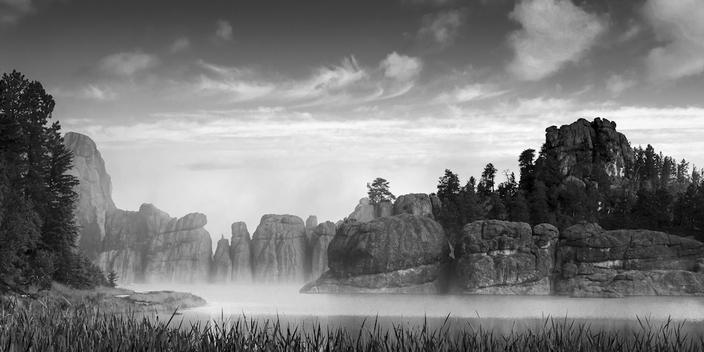 Earl Eliason, Reeds, River, and Rocks | Afterimage Gallery