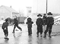 Amish Children Playing in Snow